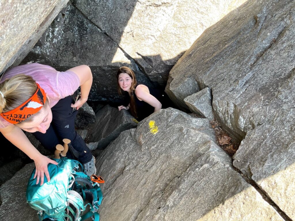 Woman Popping Her Head Out of the Boulder Cave